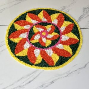 Lotus Inspired Yellow and Red Pookalam for Onam Décor